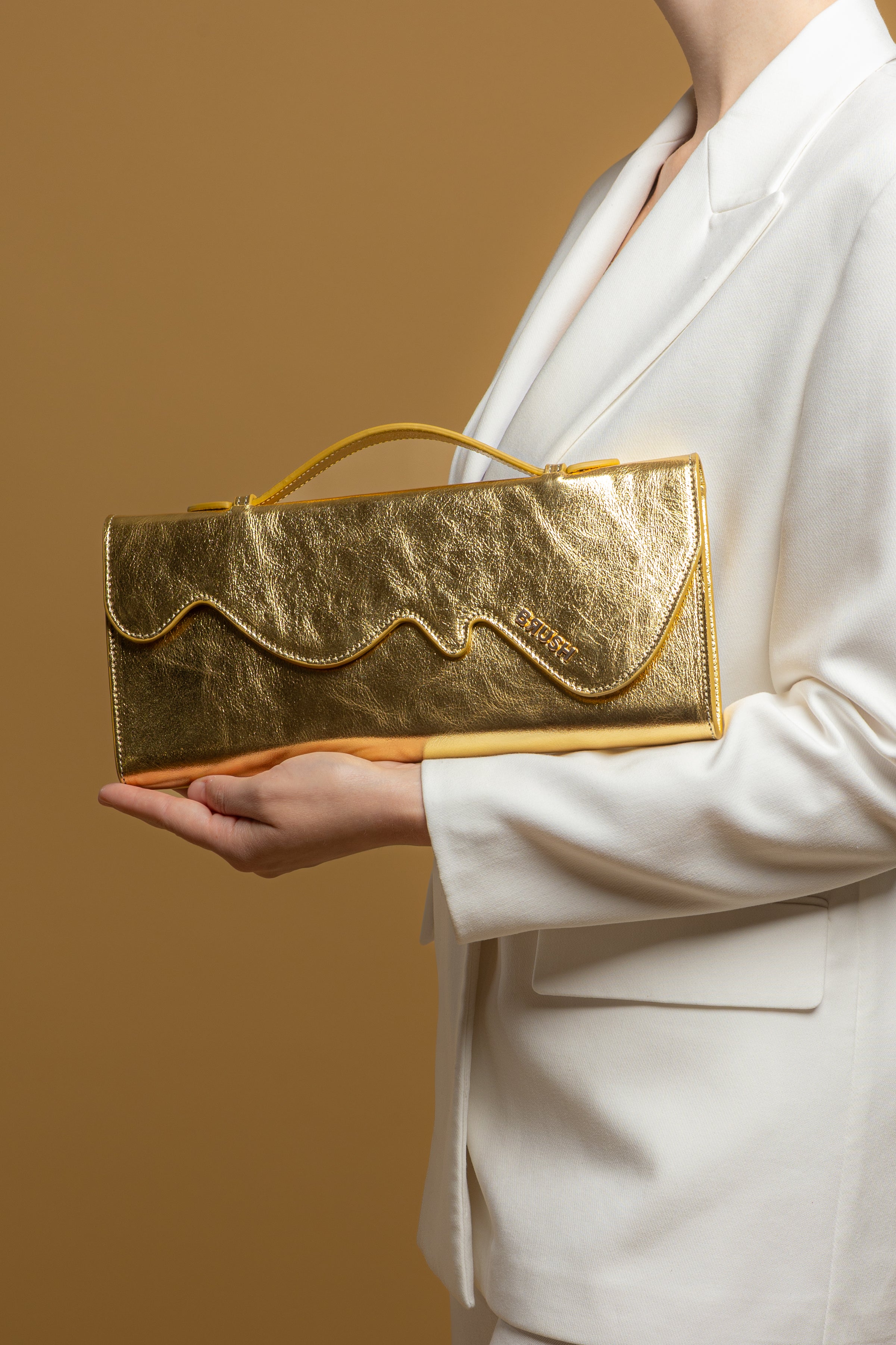 Melt Clutch Bag in Gold