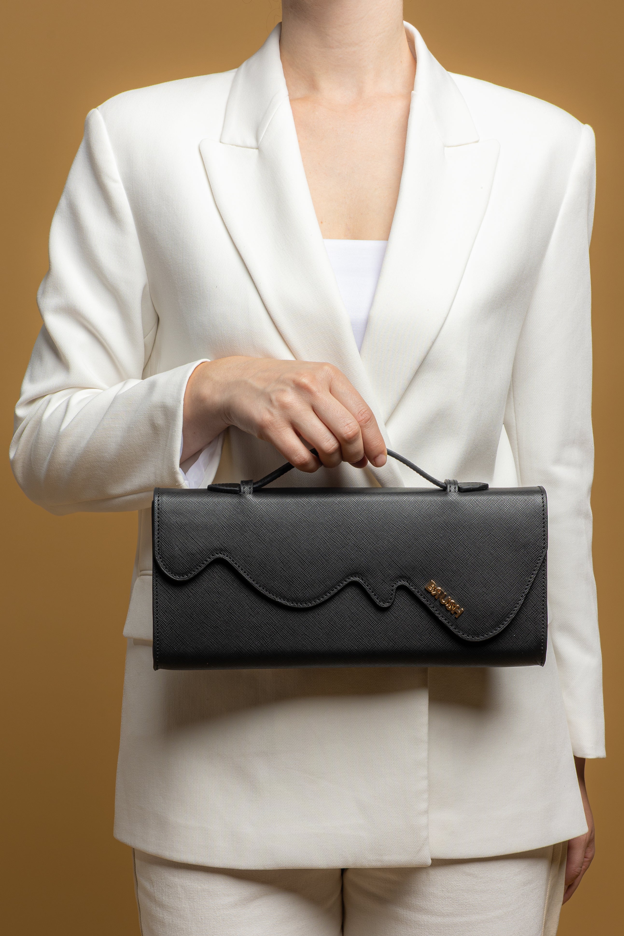 Melt Clutch Bag in Black