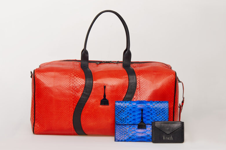 ON THE GO Duffle Bag in Red - Top Designer Bags